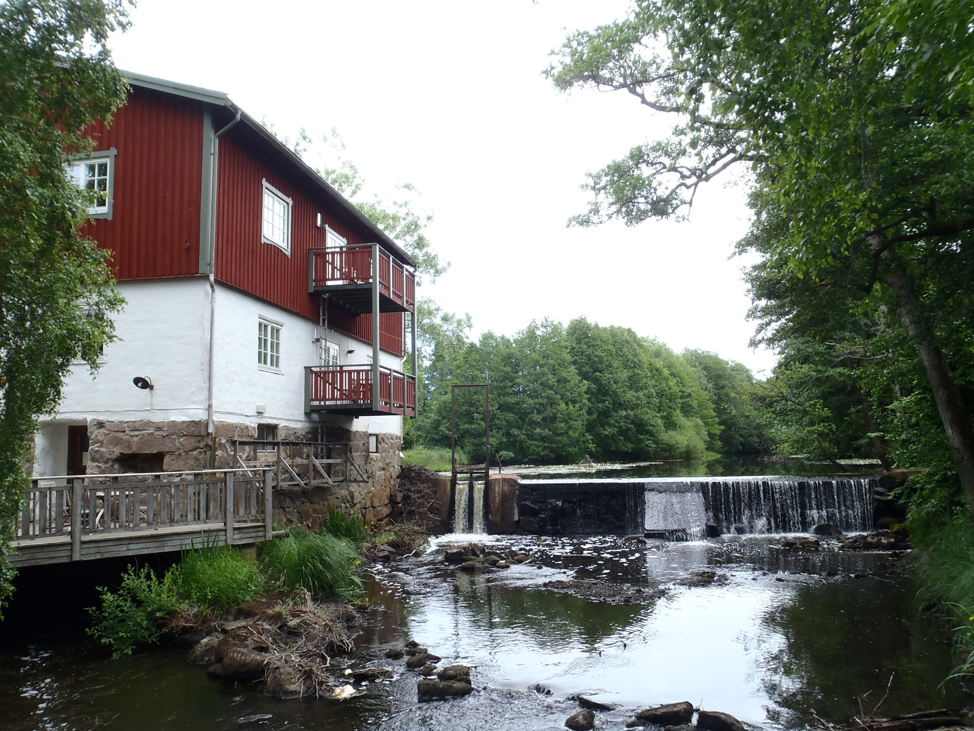 Canoeing on the river Flian by the scenic cultural environment at Herrtorps Qvarn near Skara.